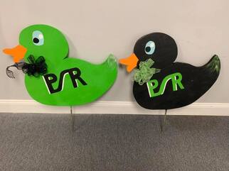 Duck signs in green and black